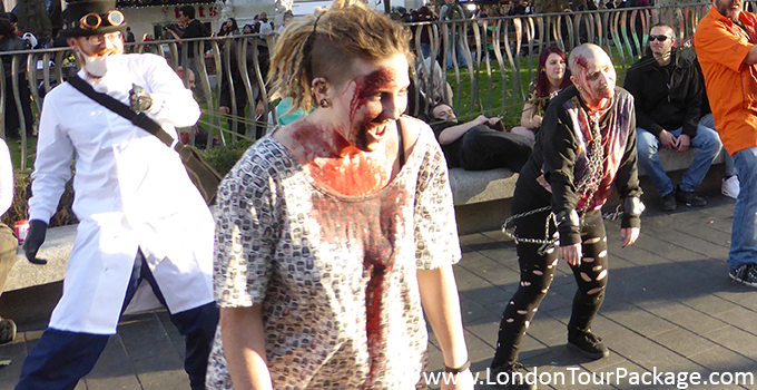 human chain pulling at halloween celebration in leicester square oct 2014