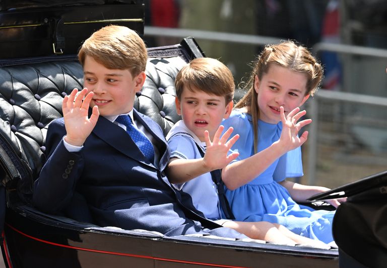 Prince George, Prince Louis and Princess Charlotte wave from the carriage procession at Trooping the Colour, June 2, 2022