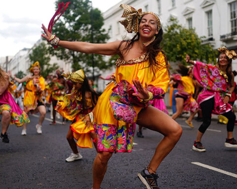 Brass band dancers in notting hill carnival 2022