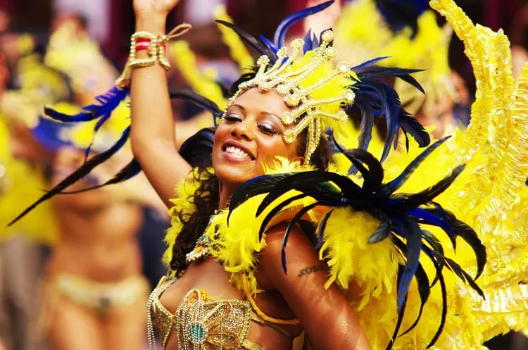 A street dancer walks at London Notting Hill Carnival