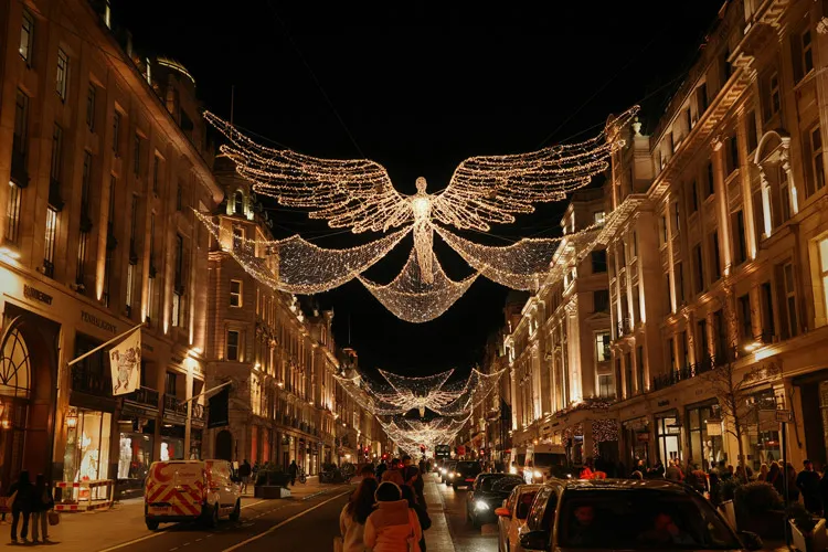 Regent Street London decorated with Christmas lights.
